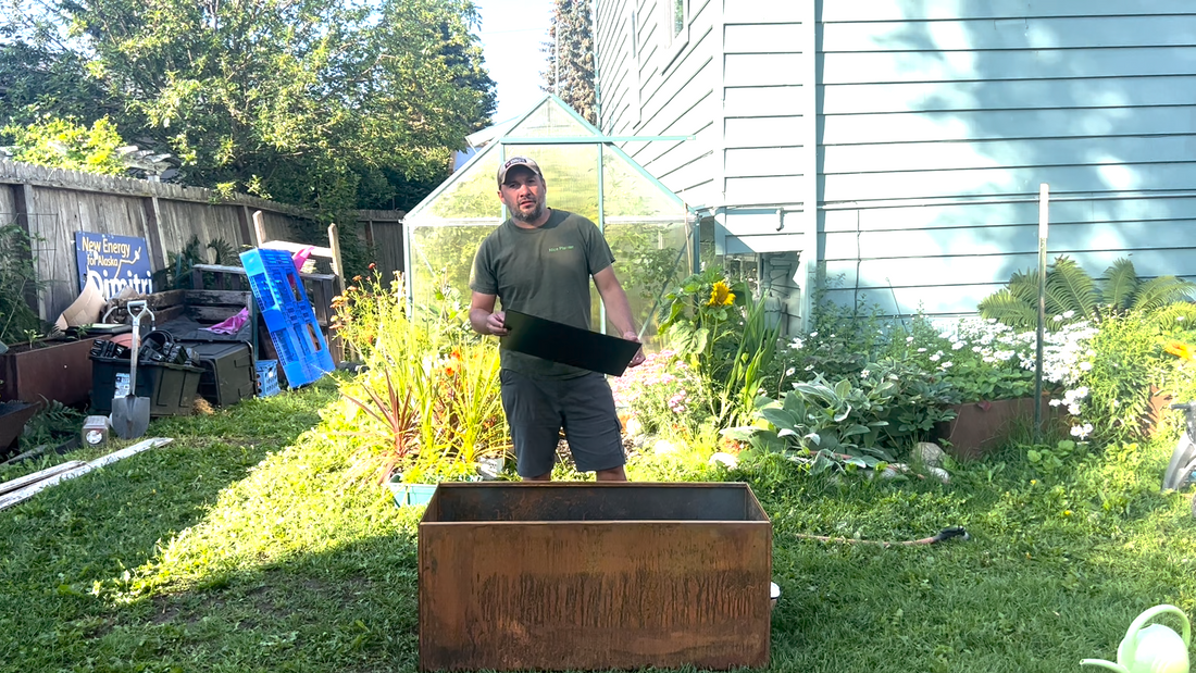 How to Line the Walls of the Metal Planter Box on the Cheap